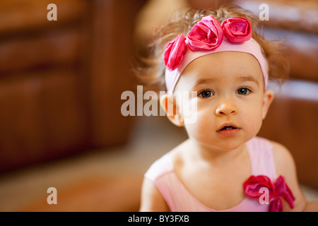 USA, Arizona, Chandler, Portrait of cute girl (2-3) wearing headband with pink roses Stock Photo