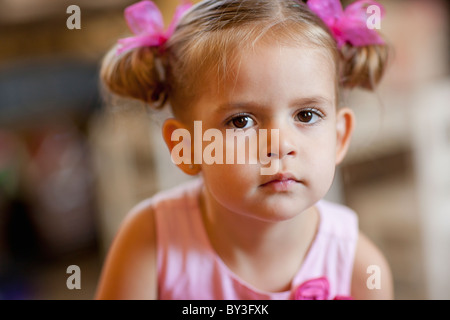 Portrait of girl (2-3) with pigtails Stock Photo