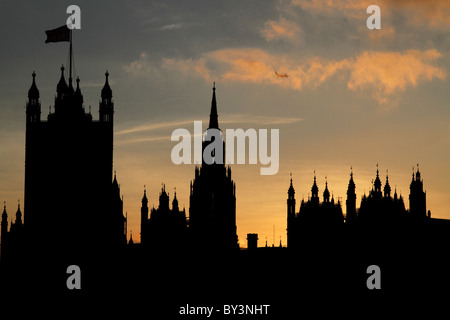 Houses of Parliament evening sunset silhouette London Thames Westminster Stock Photo