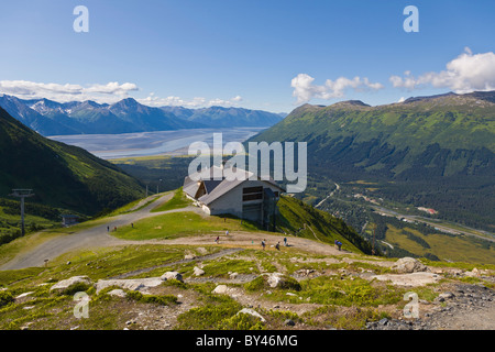 Alyeska Ski Resort in the Chugach Mountains in Girdwood Alaska with Turnagin Arm in the distance Stock Photo