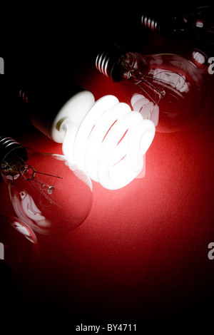 Compact Fluorescent Light bulb and tungsten Light bulb Stock Photo