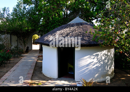 African style guest house and flower garden. Prince Albert, South Africa. Stock Photo