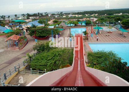 kanyakumari coastline and aerial view of different rides in bay watch water theme park,kanyakumari,tamilnadu,india. Stock Photo