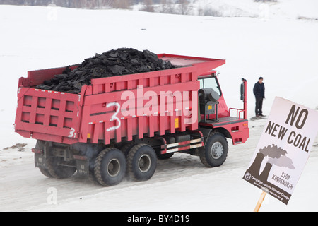 A lorry carrying coal from an open cast coal mine on the Chinese Russian border Stock Photo