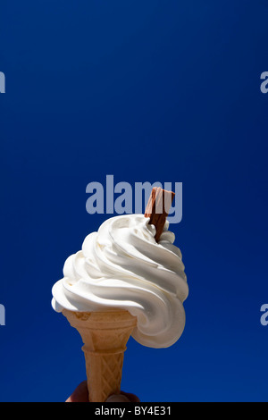 Vanilla Ice Cream in cone with chocolate flake, or 99 Stock Photo
