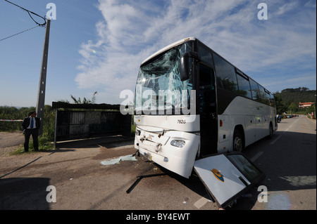 Wrecked bus with shattered windscreen glass after a car crash Stock Photo