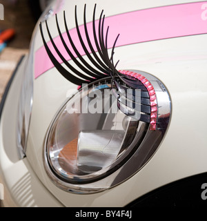 Mini headlights with eyelashes Stock Photo