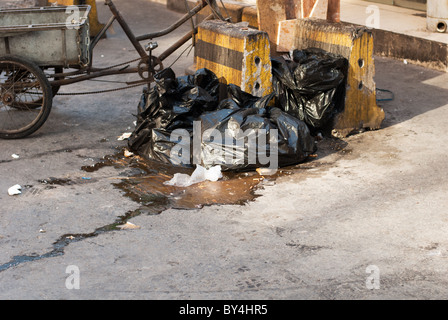 garbage left on the street Stock Photo