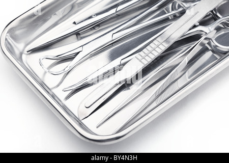 Medical instruments in a steel tray Stock Photo