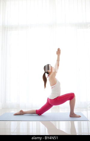 Mature Woman Doing Yoga Stock Photo