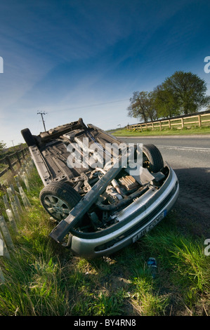 Non fatal car crash on a country road, an underage driver and the car taken without consent. Stock Photo