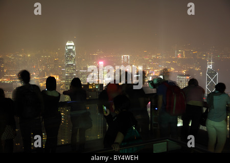 People enjoying the view over Hong Kong from Victoria Peak. Stock Photo