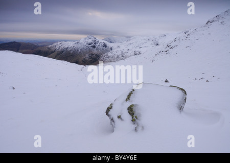 Winter view towards Pike O Blisco from The Band on Bowfell in the English Lake District