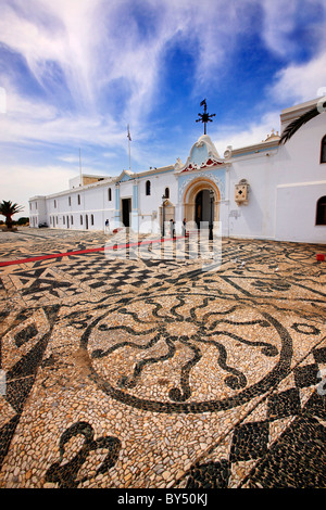 Tinos island, Greece. Traditional, mosaic made of sea pebbles (in  "Votsaloto", in greek) outside the church of Virgin Mary, Stock Photo