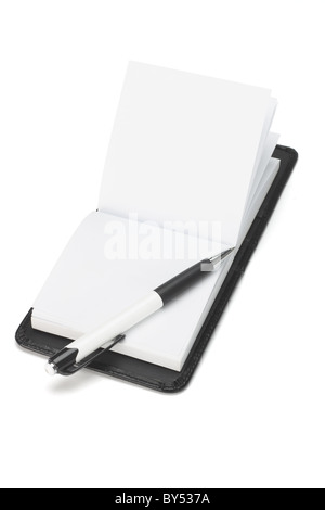 Ball point pen and open note pad on white background Stock Photo