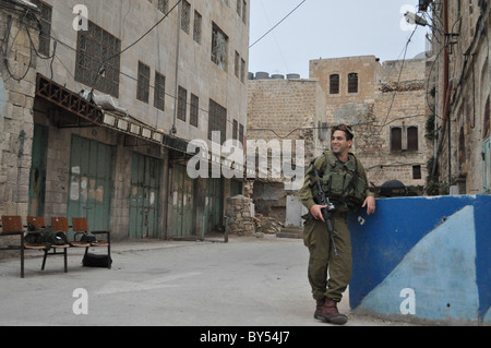 Israeli soldier in Hebron protect settlement Stock Photo