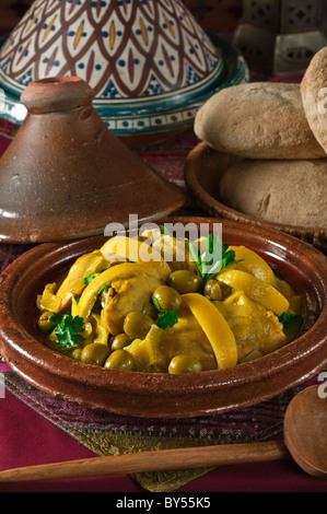 Tagine of chicken with green olives and lemon. Morocco Food. Stock Photo