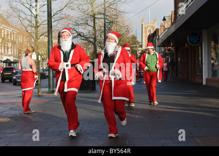 Runners taking part in St Albans Jingle Bell Jog fun run Stock Photo