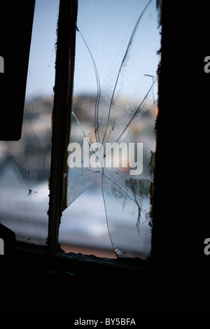 A broken window pane Stock Photo