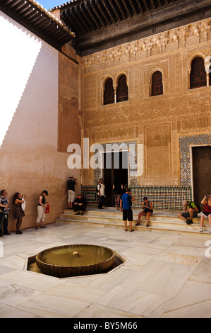 Tourists admiring the interior of the Mexuar at the Alhambra in Granada, Spain, showing the moorish architecture and features Stock Photo