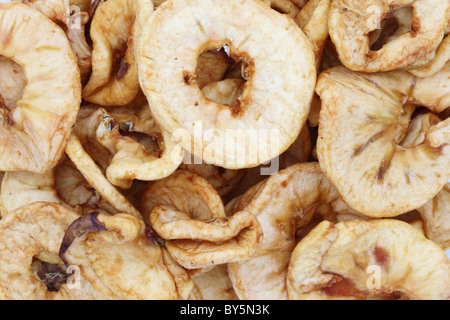 many dried apple rings as a background Stock Photo
