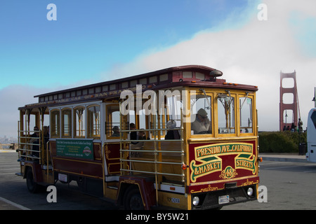 San Francisco Tourist Trolley Bus at the Golden Gate Bridge Stock Photo