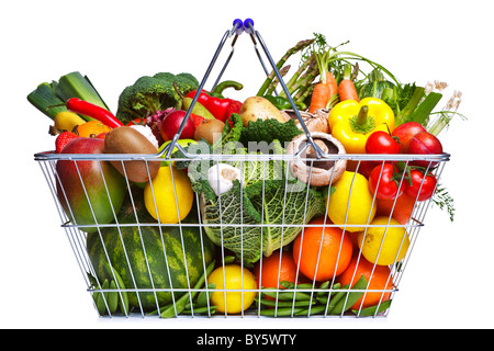 Photo of a wire shopping basket full of fresh fruit and vegetables, isolated on a white background. Stock Photo
