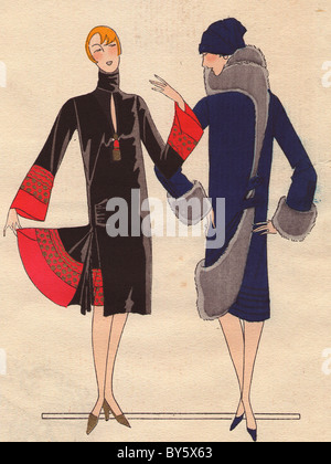 Afternoon dress with formal culottes in black and red satin embroidered with gold, and afternoon coat in blue velvet. Stock Photo