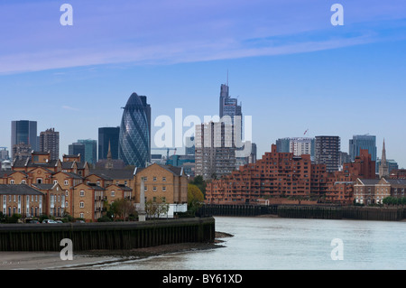 The river Thames looking back towards 'The City' from Canary Wharf. London, England. Stock Photo