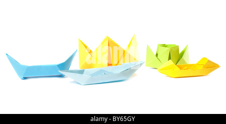 Group origami figure of boats (isolated on white) Stock Photo