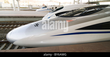 Super new Chinese bullet trains at Nanjing railway station. Stock Photo