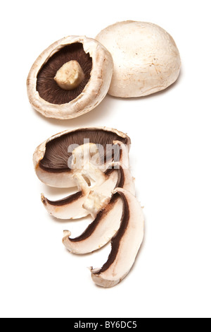 White field mushrooms isolate on a white studio background. Stock Photo