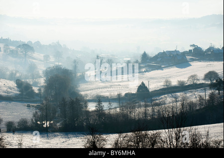 View along valley from Ruscombe with winter snow, near Stroud, Gloucestershire, England, United Kingdom Stock Photo