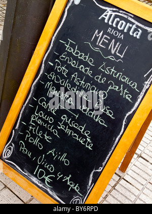 Blackboard menu outside a cafe restaurant in Asturias in northern Spain Stock Photo