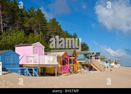 Colourful beach huts at Wells Next The Sea on the North Norfolk Coast on a summers morning Stock Photo