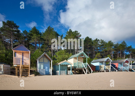 Colourful beach huts at Wells Next The Sea on the North Norfolk Coast on a summers morning Stock Photo