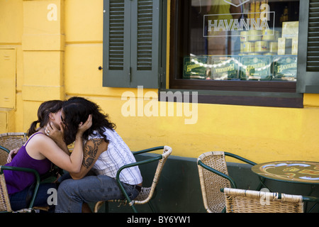 Smooching couple outside Havanna Bar in La Boca district, Buenos Aires, Argentina, South America, America Stock Photo