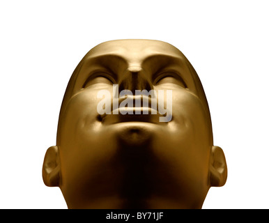 Gold mannequin head looking up against white background Stock Photo