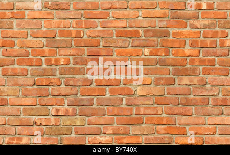 Weathered red brick wall texture seamlessly tileable Stock Photo