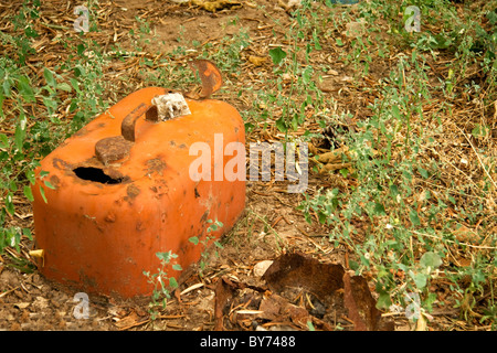 Rusty Gasoline Can on the autumnal ground. Stock Photo