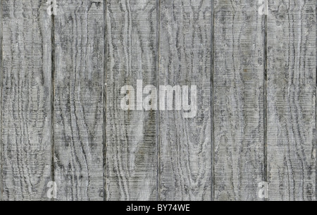 Weathered gray wooden barn siding using vertical planks Stock Photo