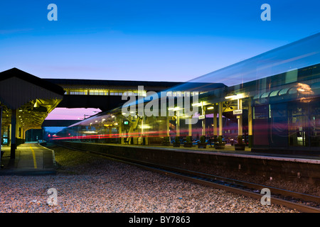 Twilight at the station - Evening train Stock Photo