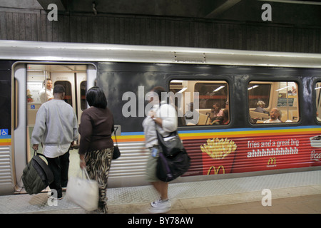 Atlanta Georgia,MARTA,Arts Center Station,platform,train,underground,mass transit,boarding,Black man men male,woman female women,passenger passengers Stock Photo