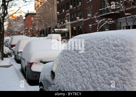 After snow storm in New York City, cars buried in snow Stock Photo