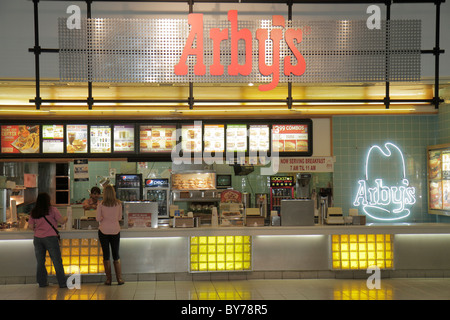 Atlanta Georgia,CNN Center,atrium fast food court plaza,Arby's,roast beef,counter,neon sign,woman customer,cashier,menu logo restaurant resstaurants Stock Photo