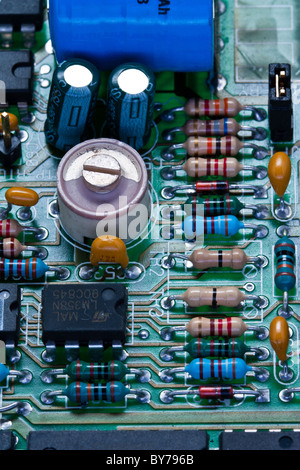 closeup of a printed circuit board and assorted electronic components Stock Photo