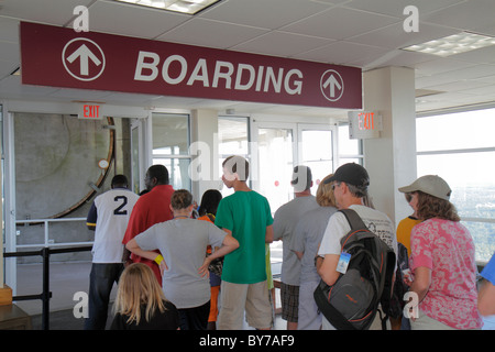 Atlanta Georgia,Stone Mountain Park,quartz monzonite,monadnock,geology,summit,Skyride,Swiss cable car,gondola lift,line,waiting,passenger passengers r Stock Photo