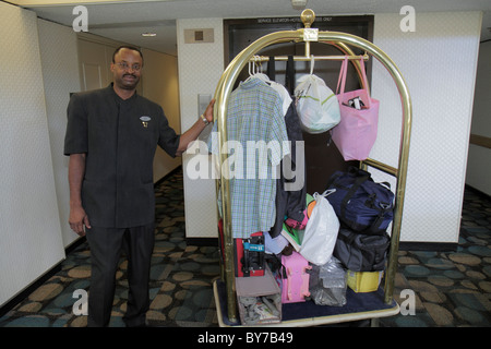 Atlanta Georgia,Peachtree Street,Atlanta Hyatt Regency,hotel hotels lodging inn motel motels,lodging,chain,hospitality,brass luggage,suitcase cart,Bla Stock Photo