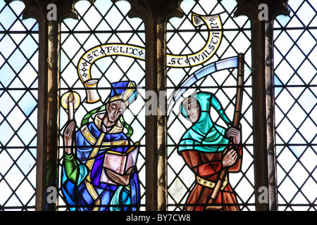 detail of stained glass window showing st walstan and st felix