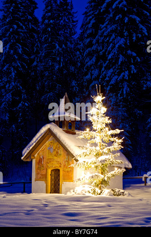 Chapel with illuminated christmas tree in Upper Bavaria, Bavaria ...